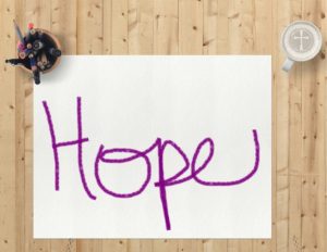 paper with the word hope written on it