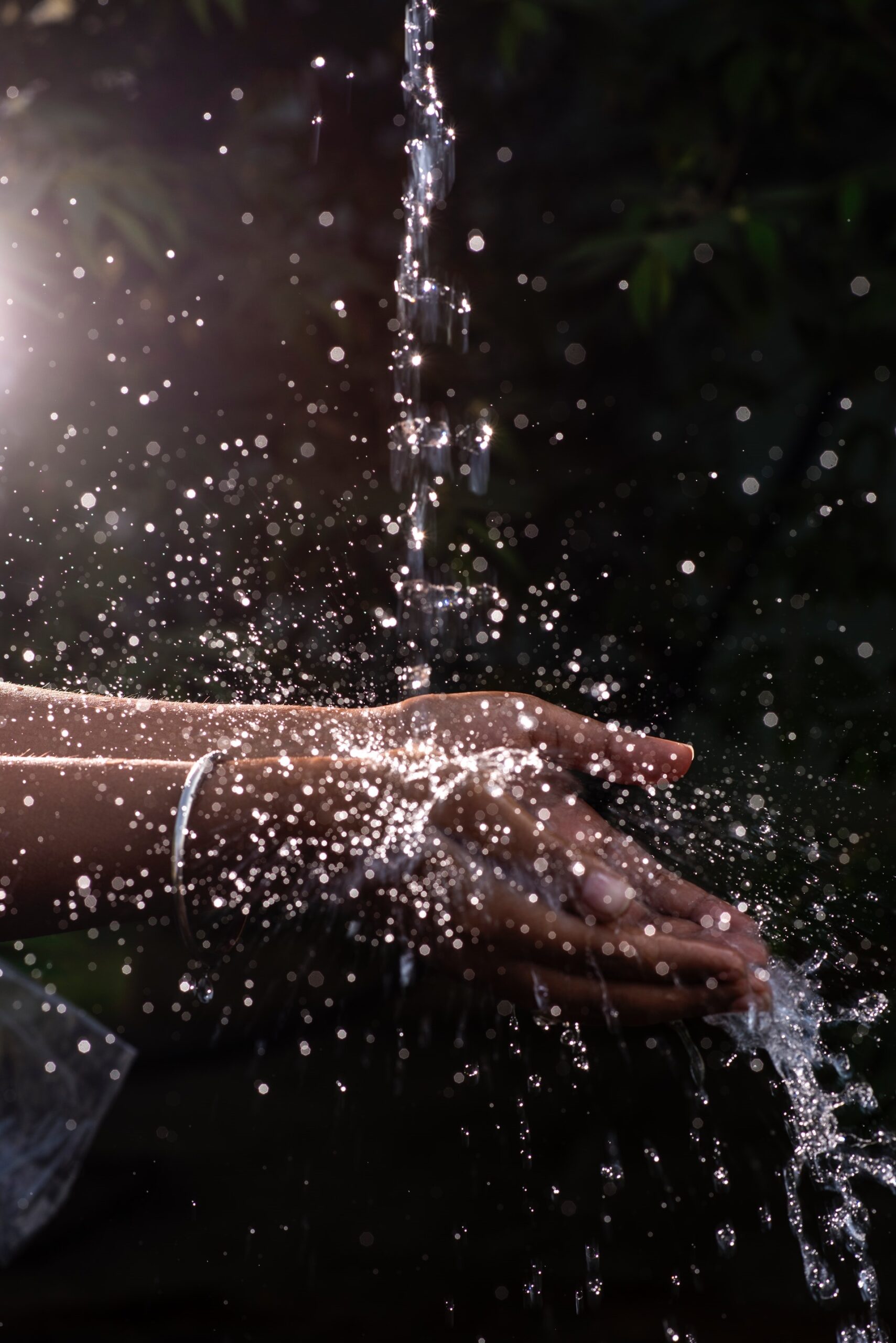 photo of hands under running water